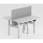 Meja kerja dua orang  saling berhadapan  dengan fitur naik-turun  (height-adjustable desk).